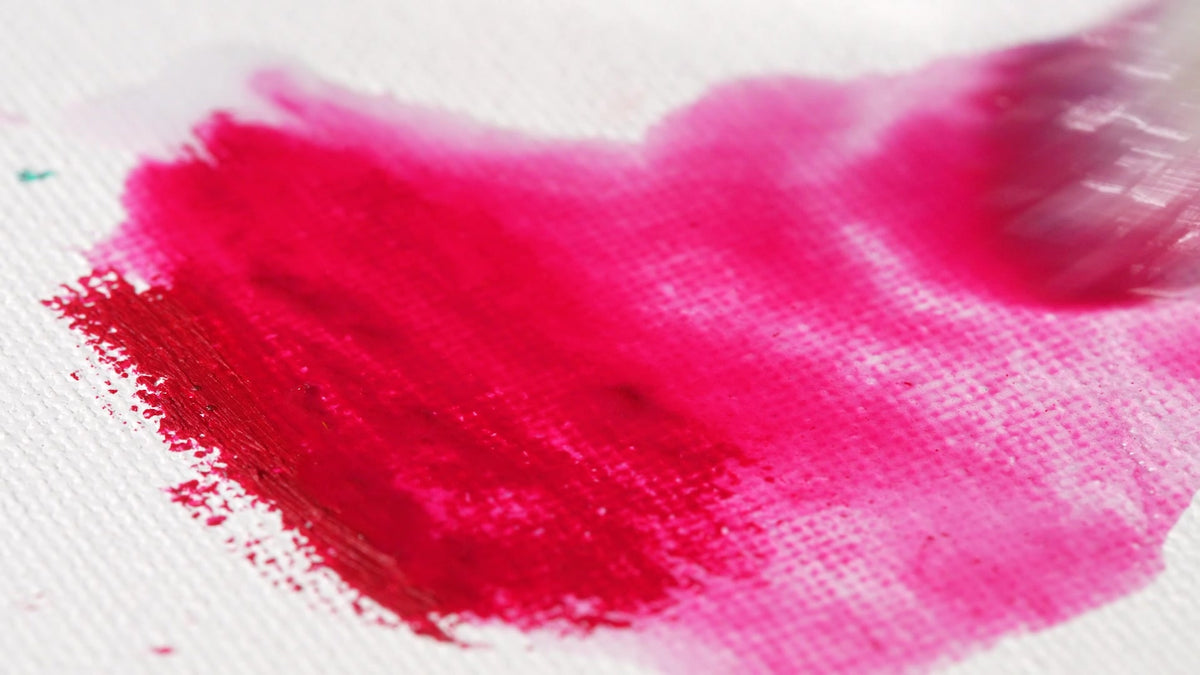 The same red oil paint stick marks softened with a wet brush; genuine demonstration frame.