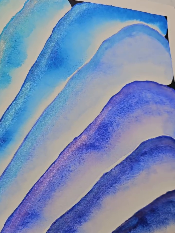 Real watercolor study finished with a PHOENIX iridescent glaze over a traditional watercolor base. Frame from an authorized artist demonstration; not an AI image.