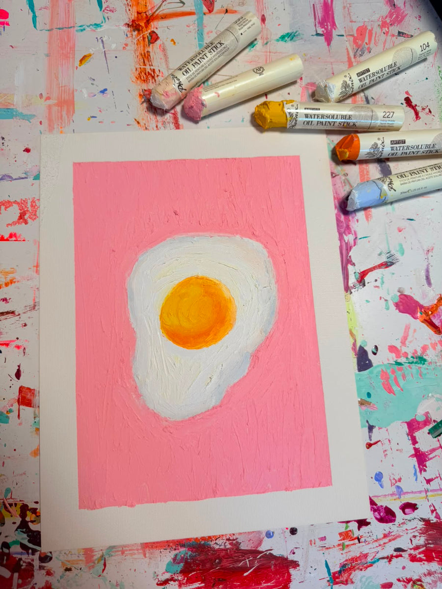 Fried egg still life in a pink color field — @shannonraeart